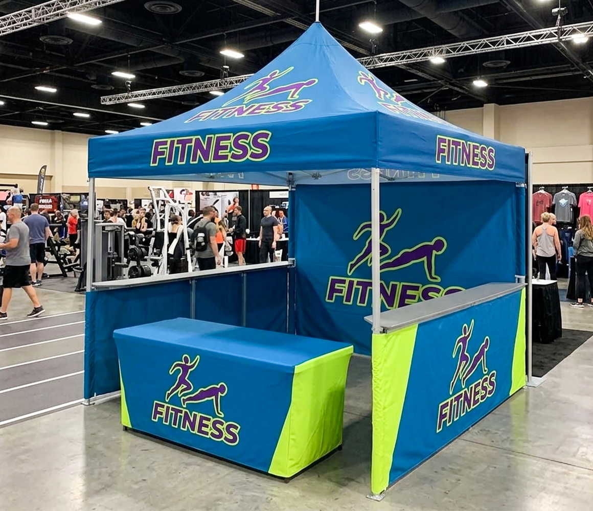 Printed trade show tent displaying brand graphics at an exhibition booth.