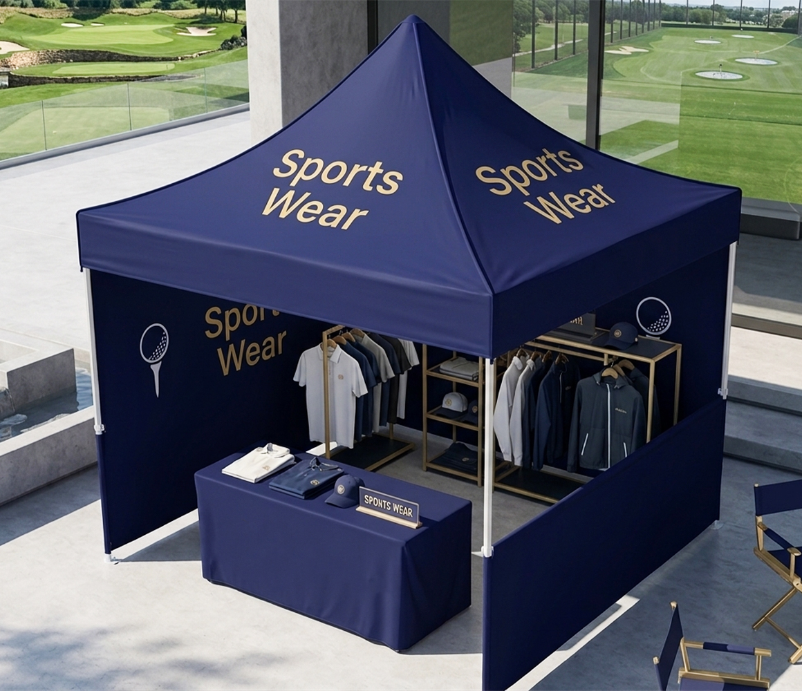 Portable event kit including a pop-up tent and custom table cover.