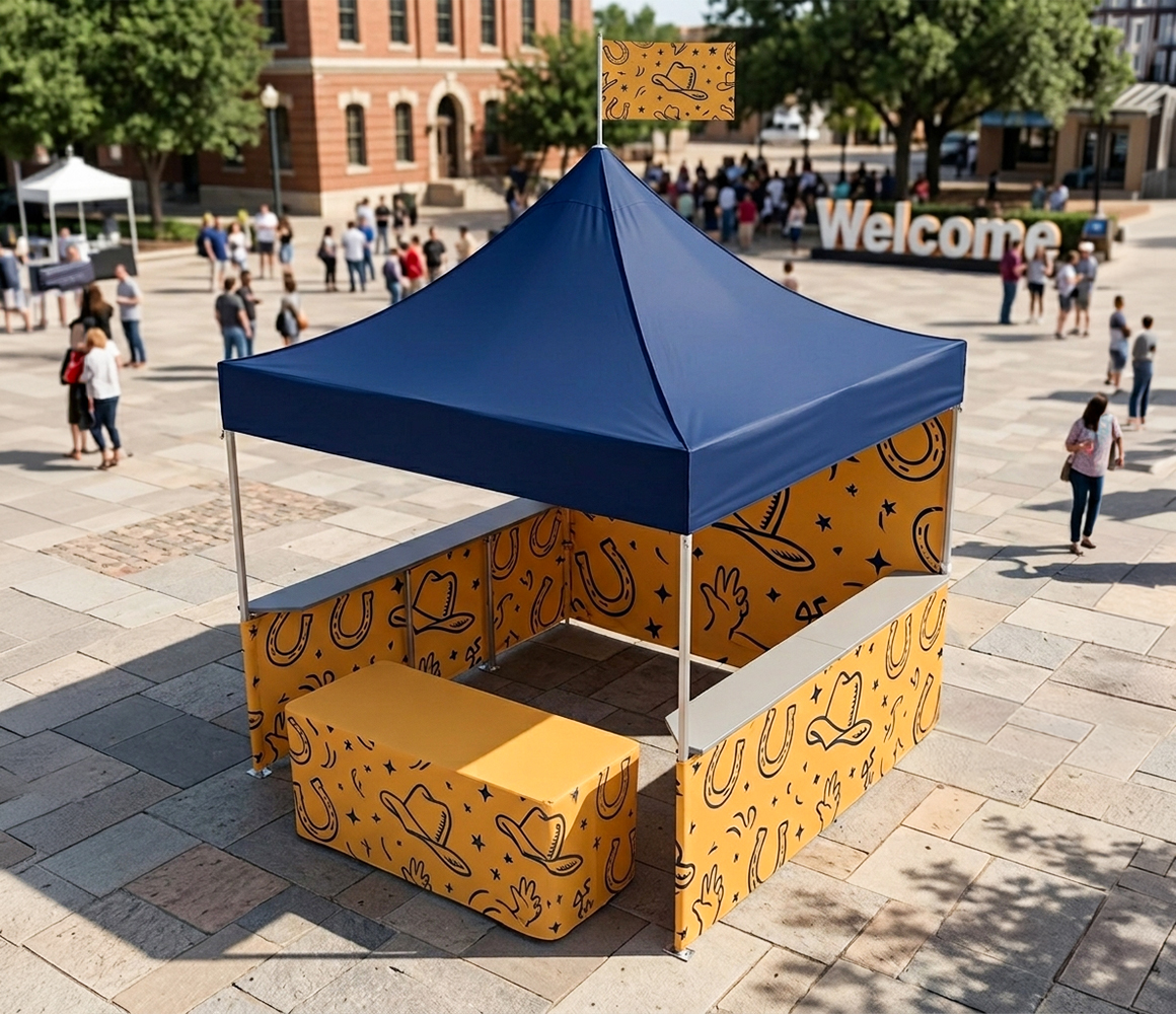Product display under a custom tent with matching table cover branding.