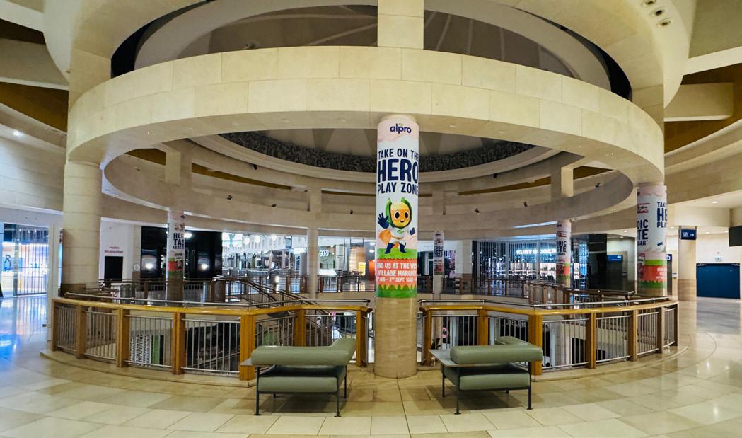 ARC UK pillar wrap graphics promoting Alpro at Bluewater Shopping Centre