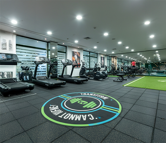 Modern gym interior with exercise equipment, a construction industry trend.