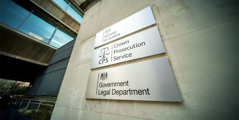 Government sector signs for Ministry of Justice and legal departments.