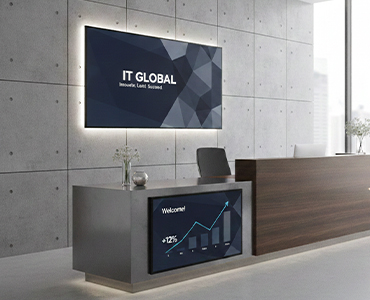 Commercial real estate reception area with digital wayfinding signage.