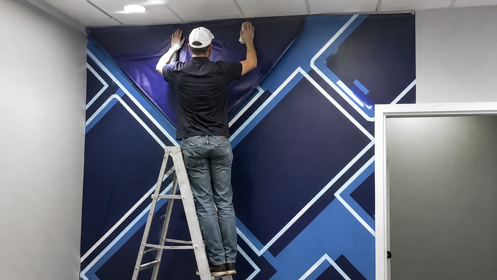 Wall graphics strengthening brand recognition in a business environment