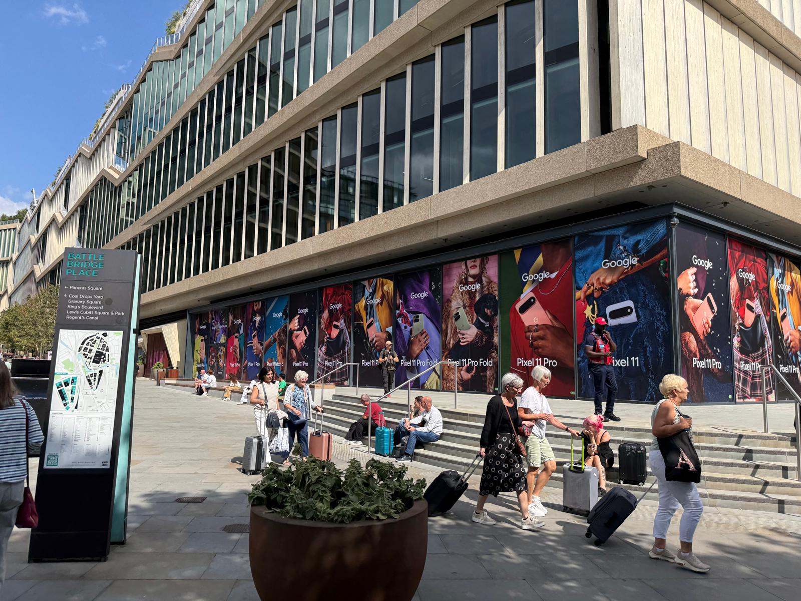 Large format window graphics covering a commercial building with colourful product campaign imagery